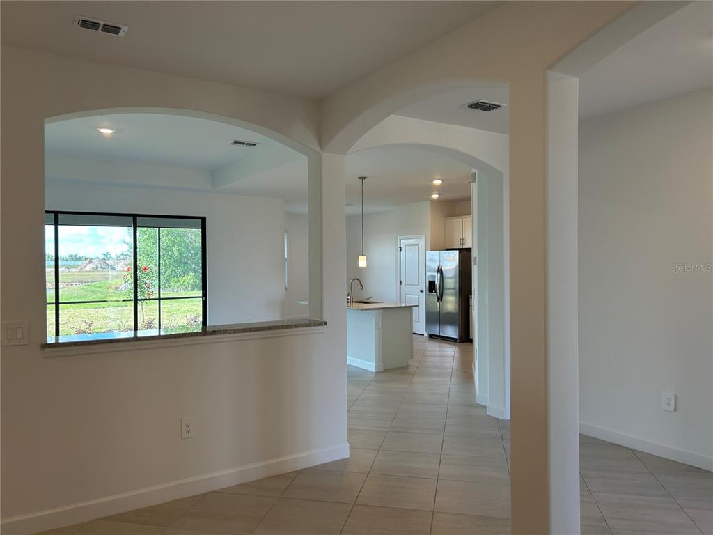 15513 White Linen Drive Lakewood Ranch, FL 34211 - Photo 16 of 35 a view of a living room with a large window