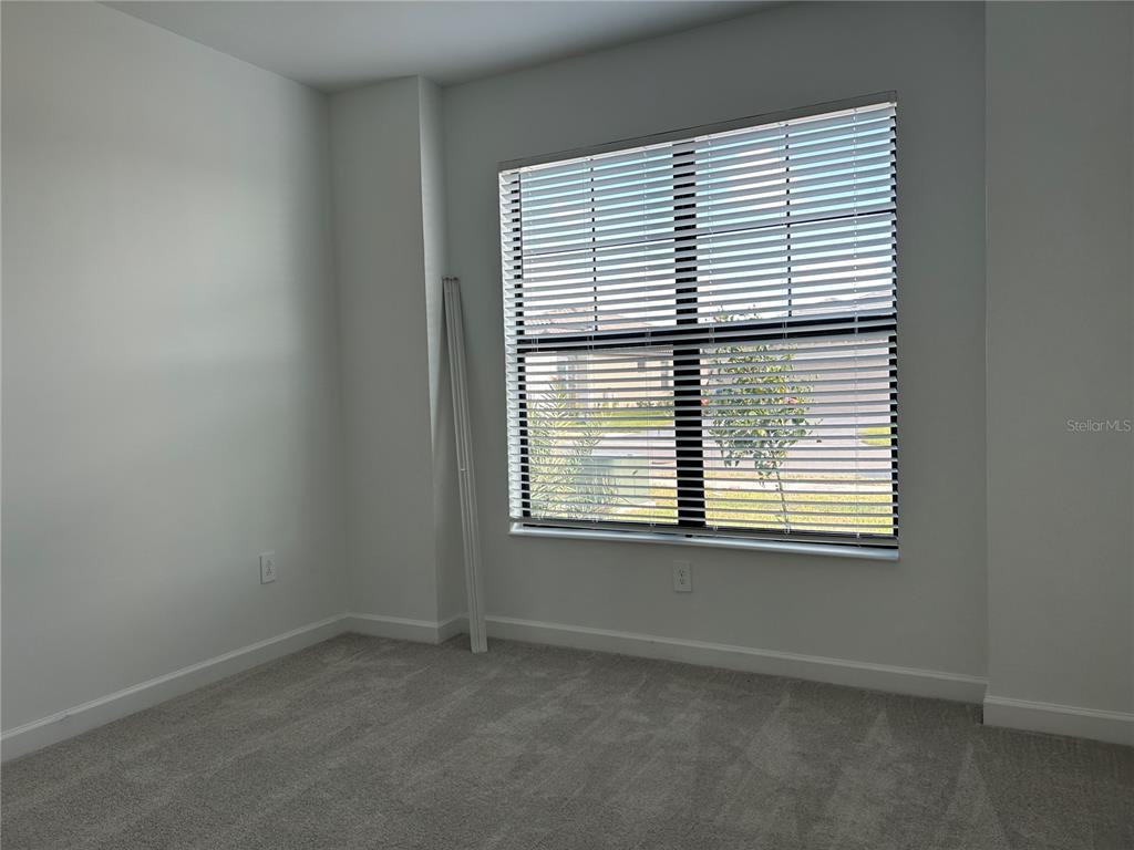 15513 White Linen Drive Lakewood Ranch, FL 34211 - Photo 17 of 35 an empty room with a window