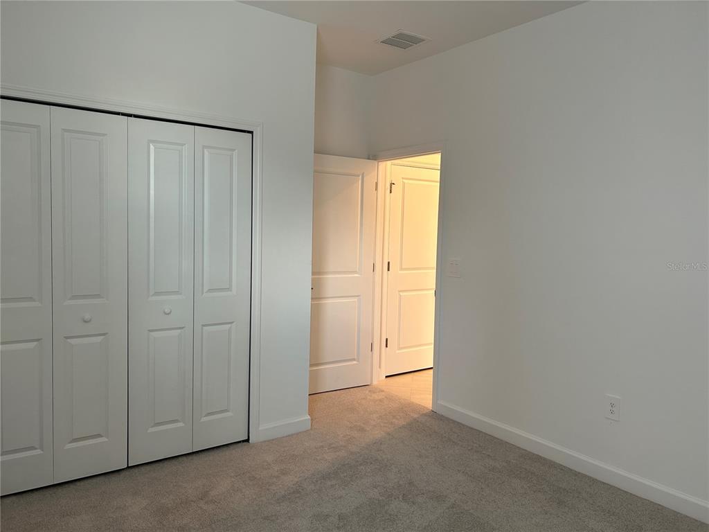 15513 White Linen Drive Lakewood Ranch, FL 34211 - Photo 18 of 35 a view of an empty room