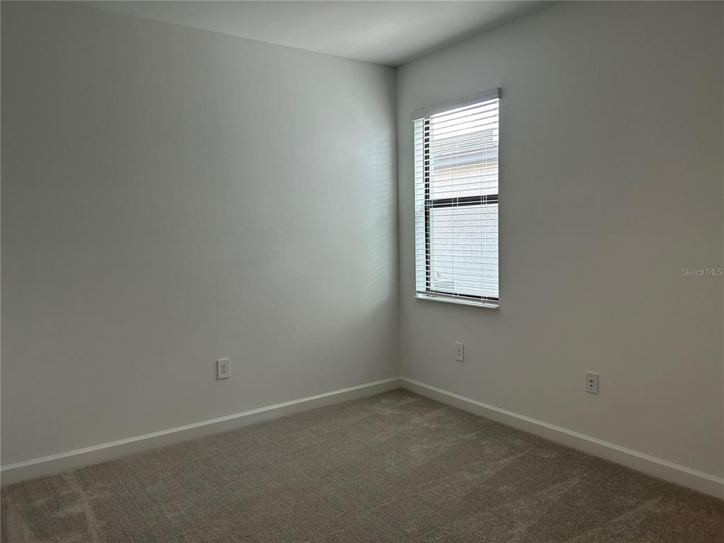 15513 White Linen Drive Lakewood Ranch, FL 34211 - Photo 19 of 35 an empty room with a window
