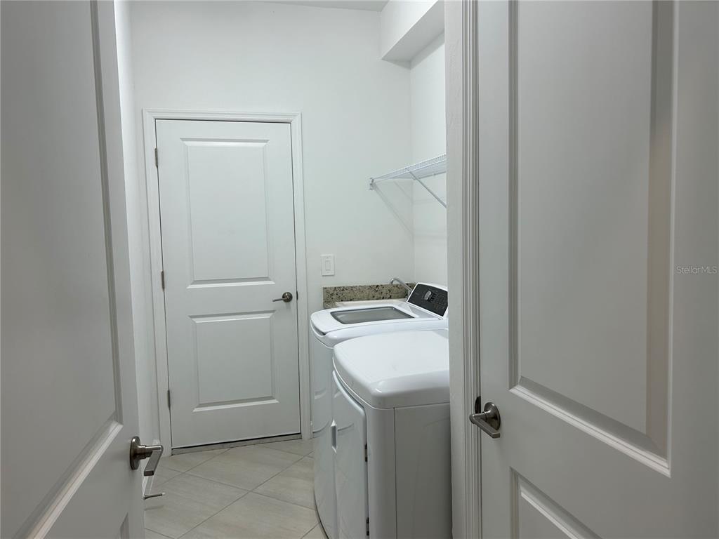 15513 White Linen Drive Lakewood Ranch, FL 34211 - Photo 20 of 35 a utility room with dryer and washer
