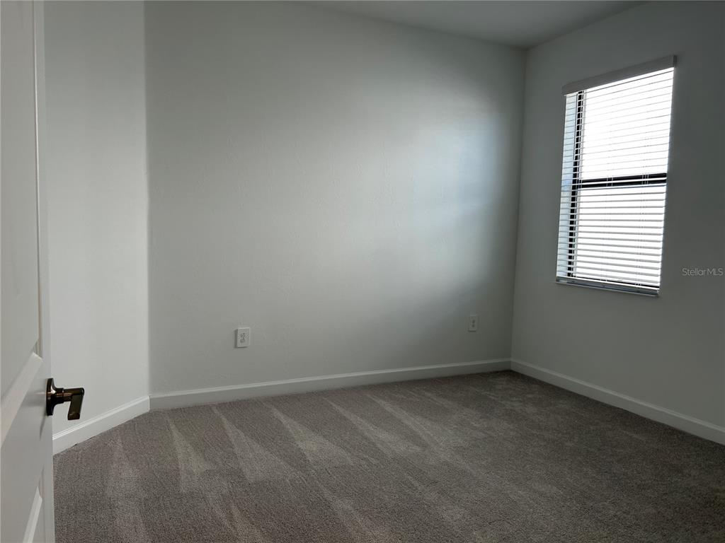 15513 White Linen Drive Lakewood Ranch, FL 34211 - Photo 22 of 35 an empty room with a window