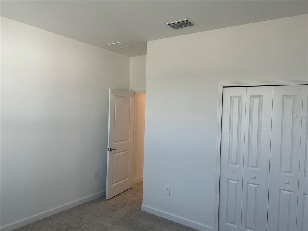 15513 White Linen Drive Lakewood Ranch, FL 34211 - Photo 26 of 35 a view of an empty room