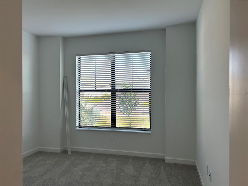 15513 White Linen Drive Lakewood Ranch, FL 34211 - Photo 28 of 35 an empty room with a window