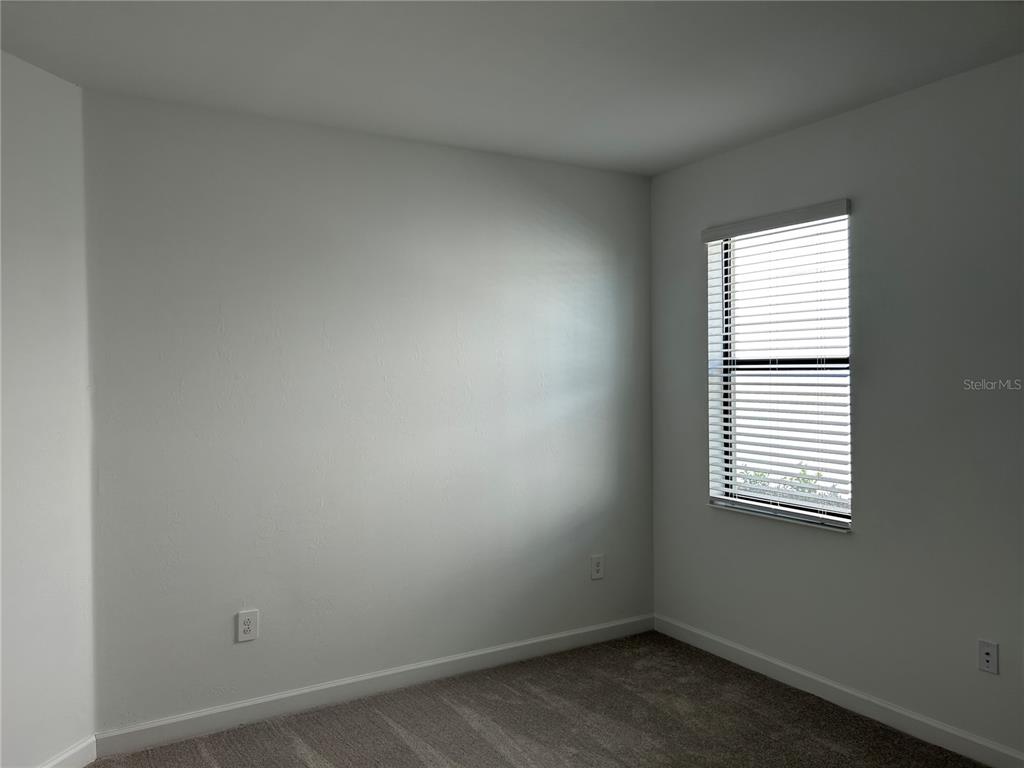 15513 White Linen Drive Lakewood Ranch, FL 34211 - Photo 29 of 35 an empty room with a window