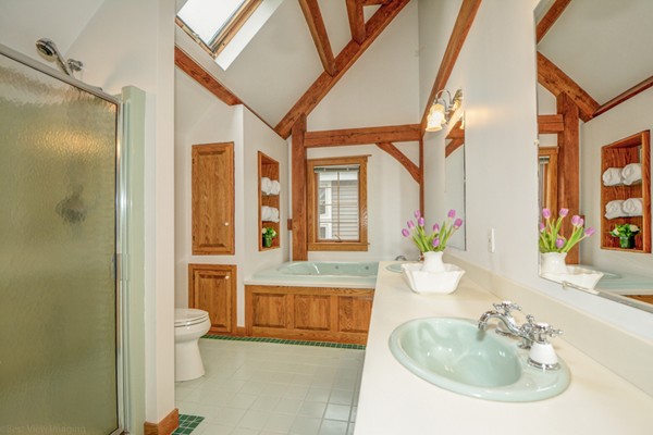 53 Porter Road Andover, MA 01810 - Photo 11 of 17 a bathroom with a granite countertop sink and a large mirror