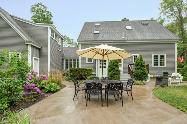 53 Porter Road Andover, MA 01810 - Photo 13 of 17 a view of a chair and table in patio