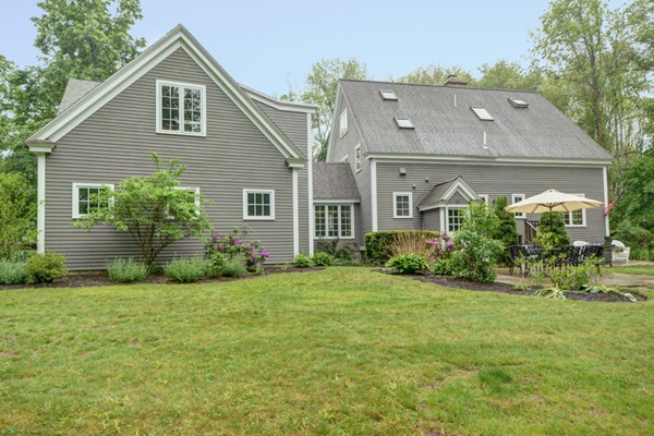53 Porter Road Andover, MA 01810 - Photo 14 of 17 a front view of house with yard and green space
