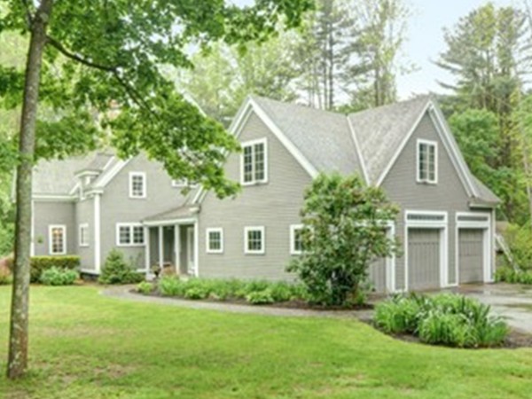 53 Porter Road Andover, MA 01810 - Photo 3 of 17 a front view of a house with a yard and trees