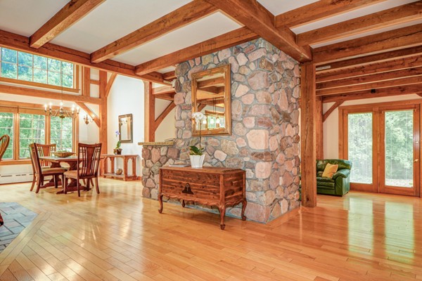 53 Porter Road Andover, MA 01810 - Photo 8 of 17 a living room filled with furniture and floor to ceiling windows