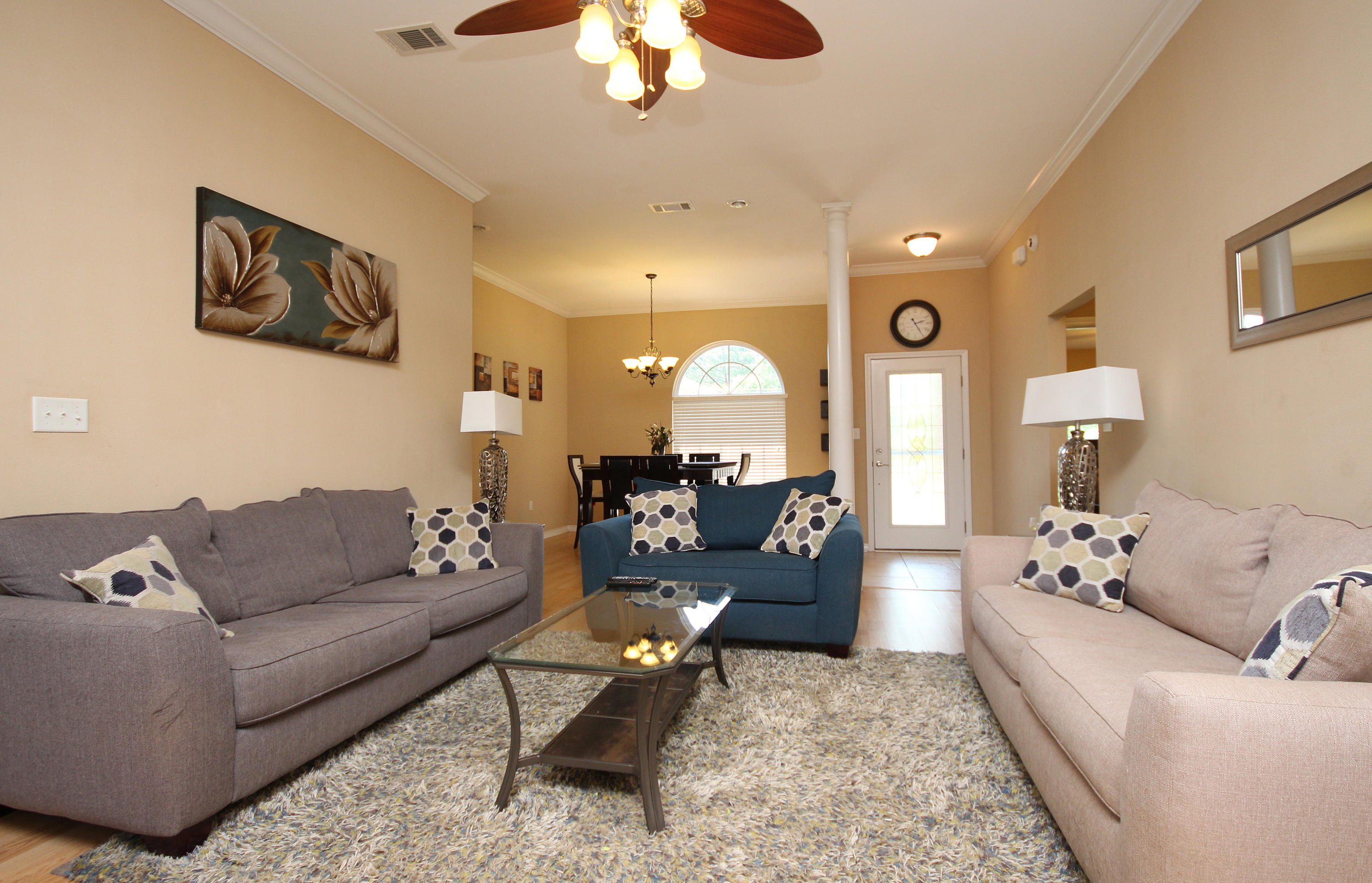 5819 Roberts Road Crestview, FL 32536 - Photo 12 of 36 a living room with furniture or chandelier and a couch