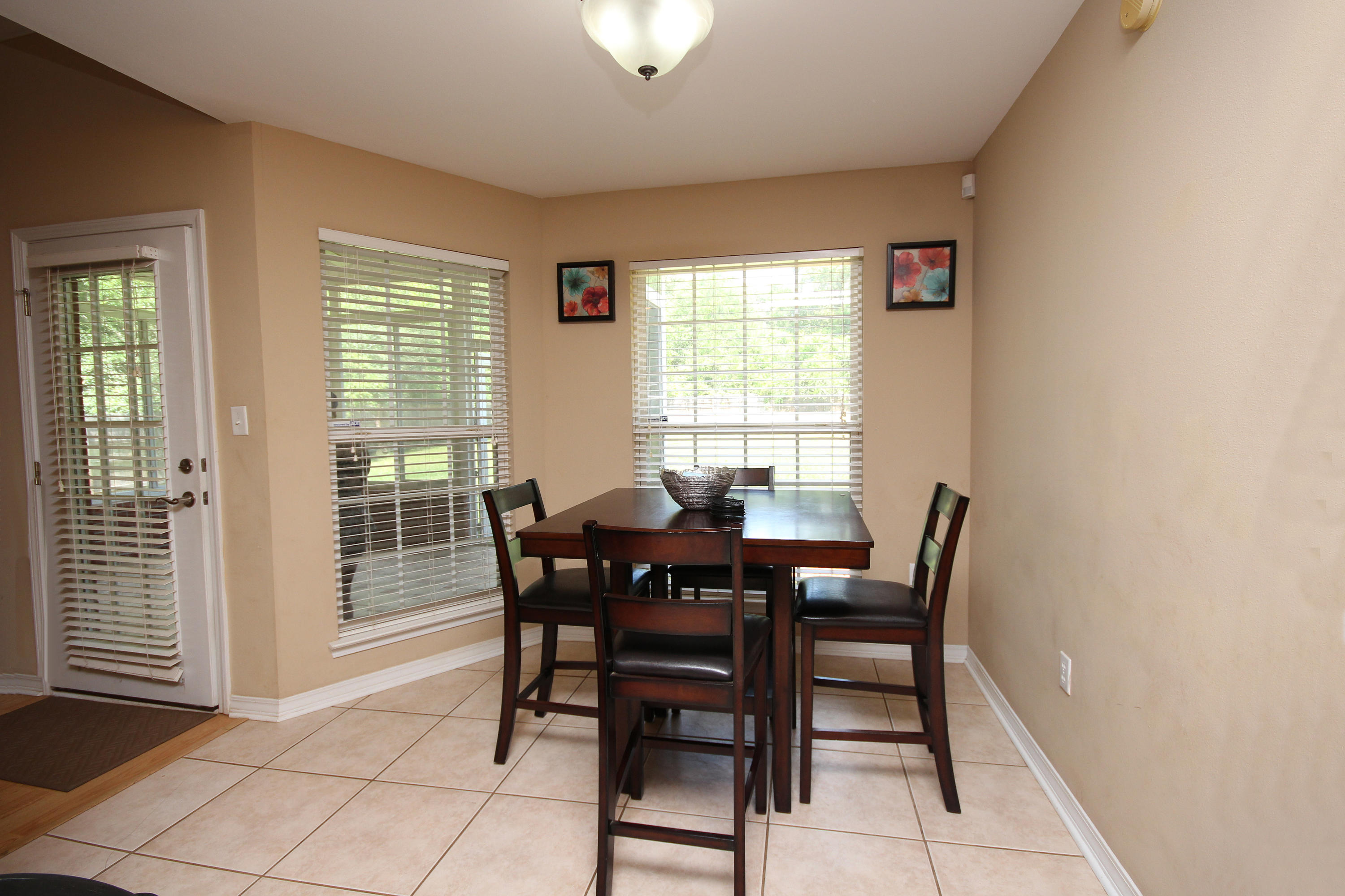 5819 Roberts Road Crestview, FL 32536 - Photo 21 of 36 a view of a dining room with furniture and window