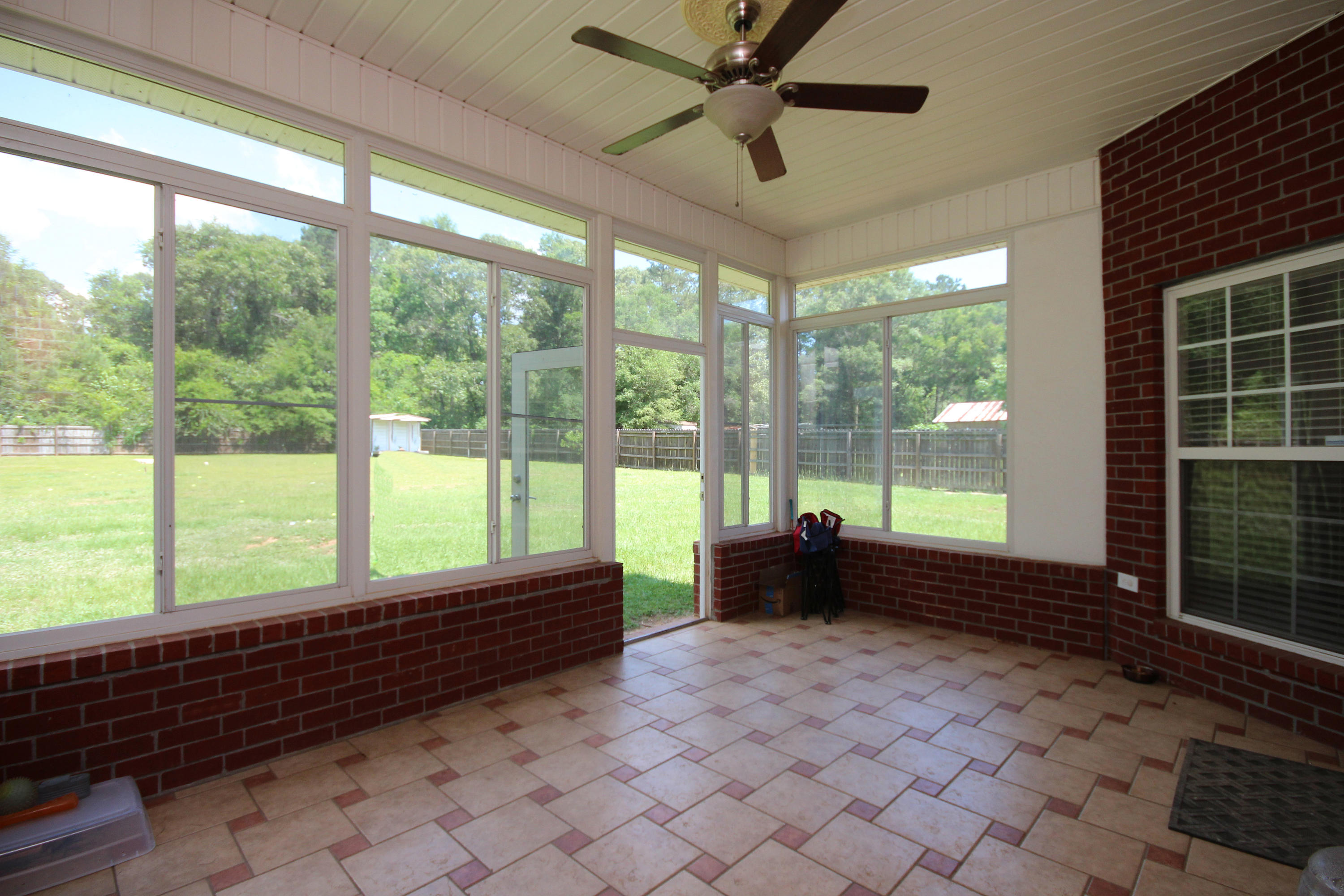 5819 Roberts Road Crestview, FL 32536 - Photo 23 of 36 a room with furniture and large windows