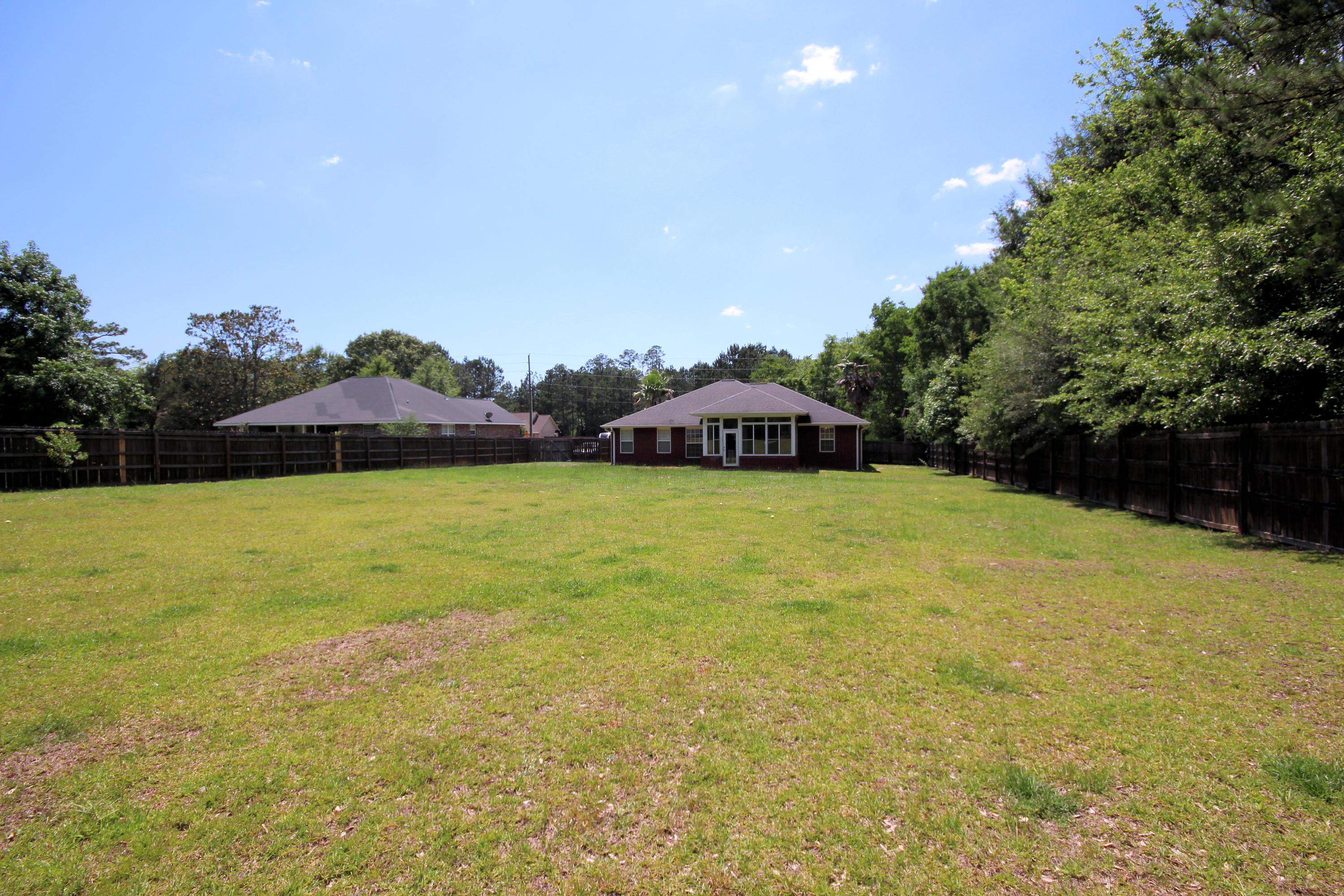 5819 Roberts Road Crestview, FL 32536 - Photo 35 of 36 a view of a lake with a big yard