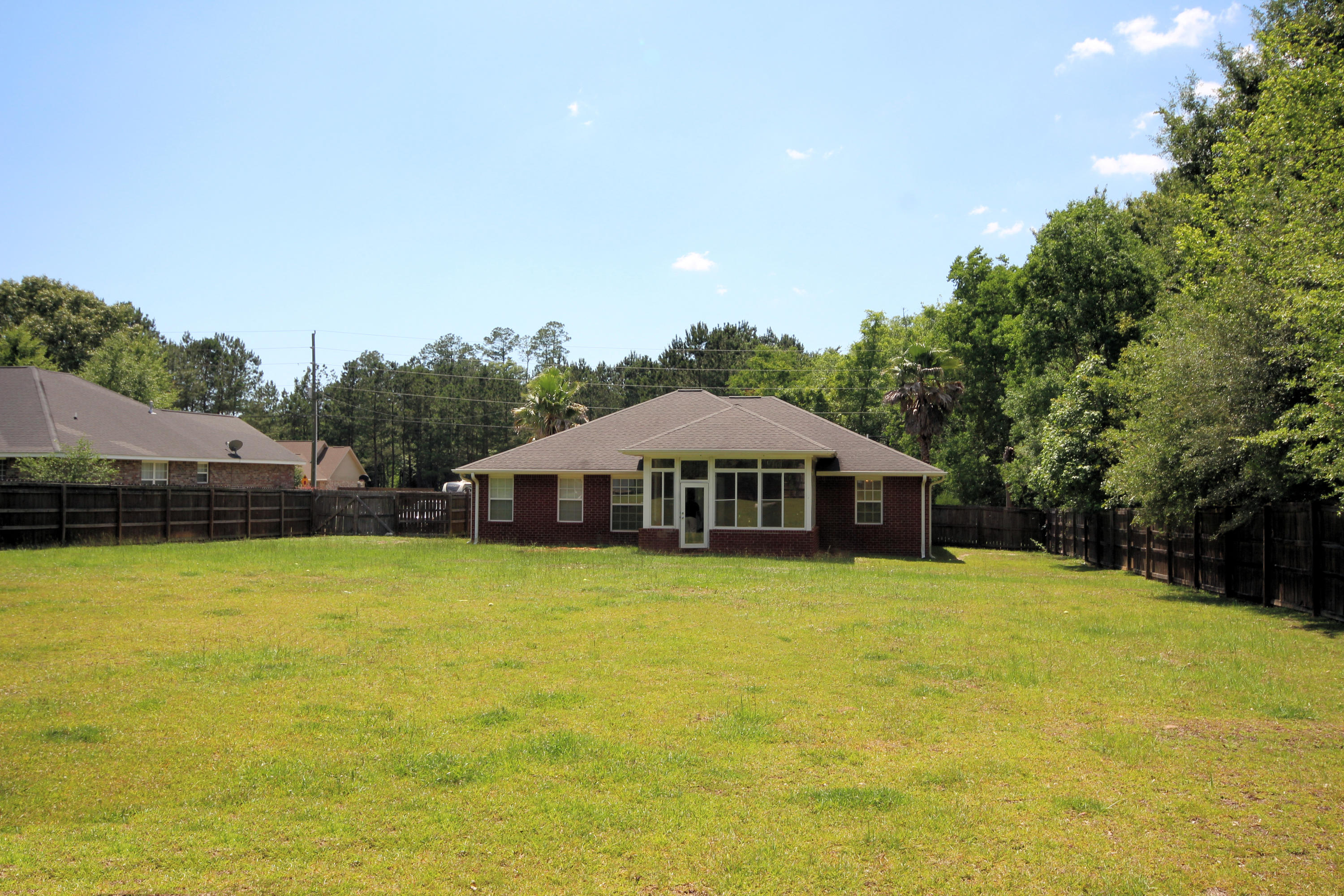 5819 Roberts Road Crestview, FL 32536 - Photo 36 of 36 a yellow house with a outdoor space
