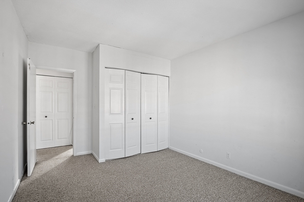 170 Lake Shore Road, Unit 4 Boston, MA 02135 - Photo 15 of 36 a view of an empty room