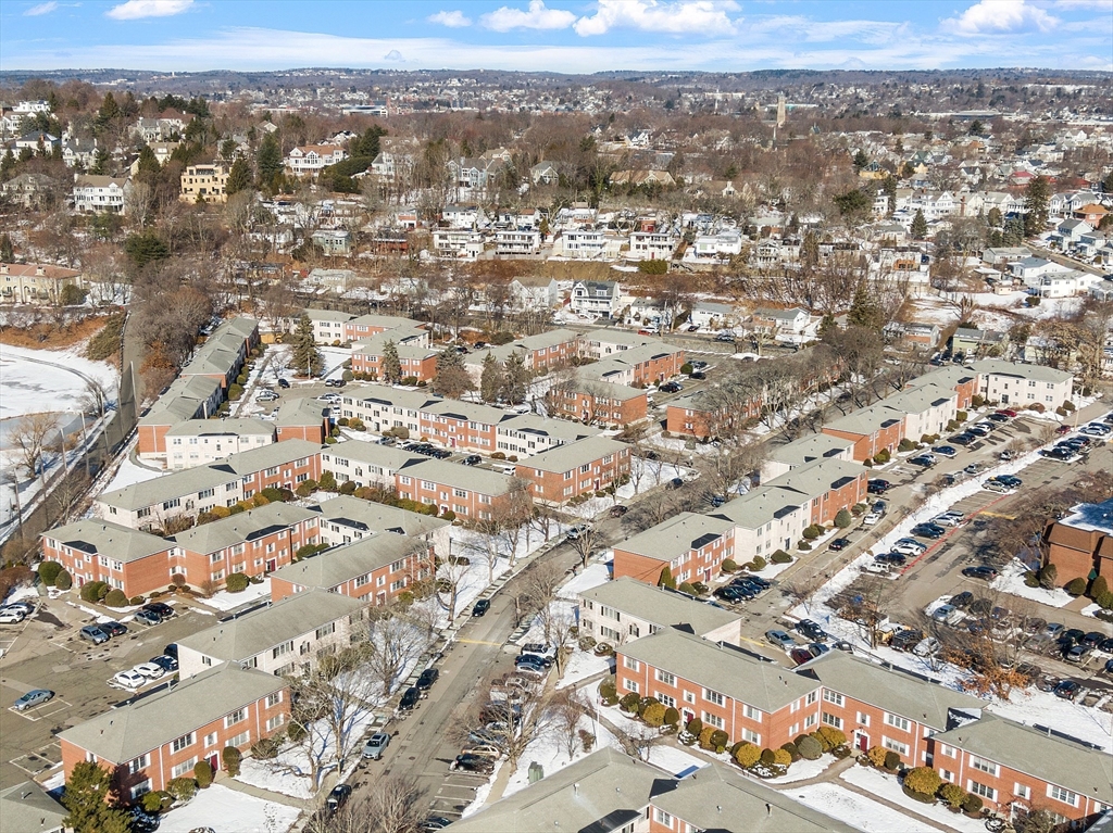 170 Lake Shore Road, Unit 4 Boston, MA 02135 - Photo 34 of 36 an aerial view of residential building with parking space