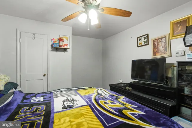 a view of staircase with white walls and windows