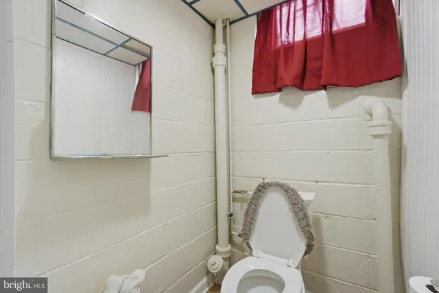 a kitchen with a stove top oven sink and cabinets