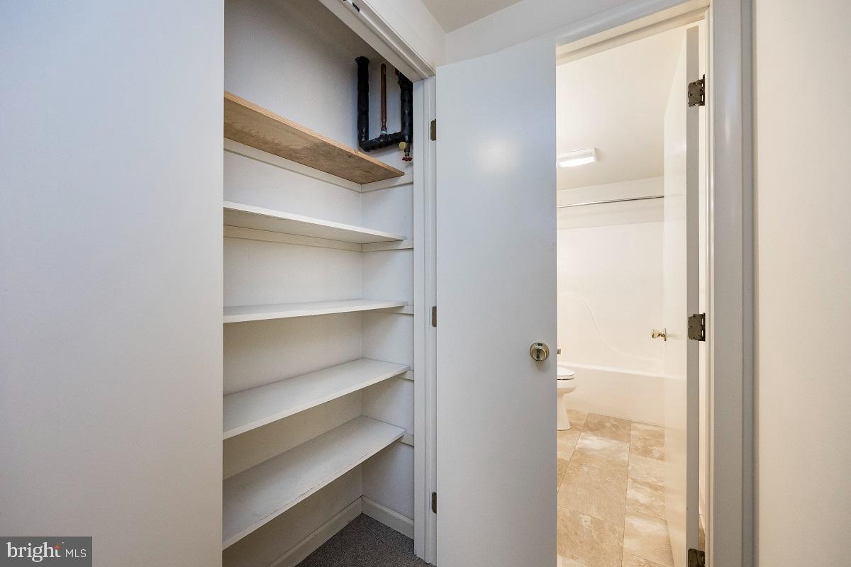 3183 Main Street, Unit 3 Green Lane, PA 18054 - Photo 17 of 28 a view of walk in closet with empty racks