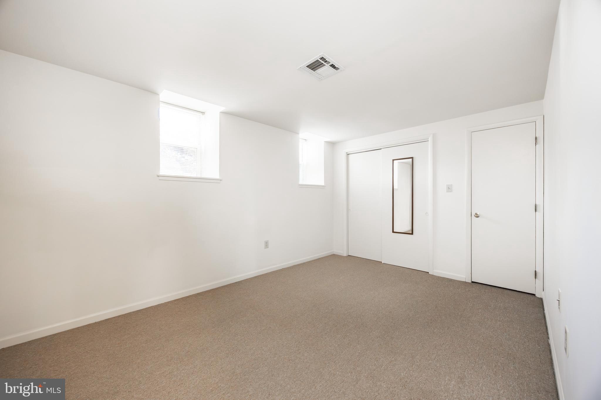 3183 Main Street, Unit 3 Green Lane, PA 18054 - Photo 19 of 28 a view of an empty room with a window