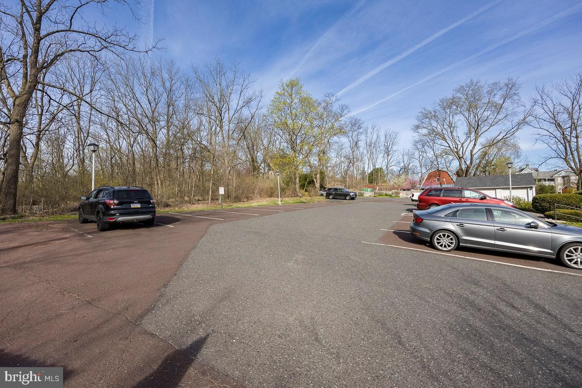 3183 Main Street, Unit 3 Green Lane, PA 18054 - Photo 24 of 28 a car parked on the side of a street