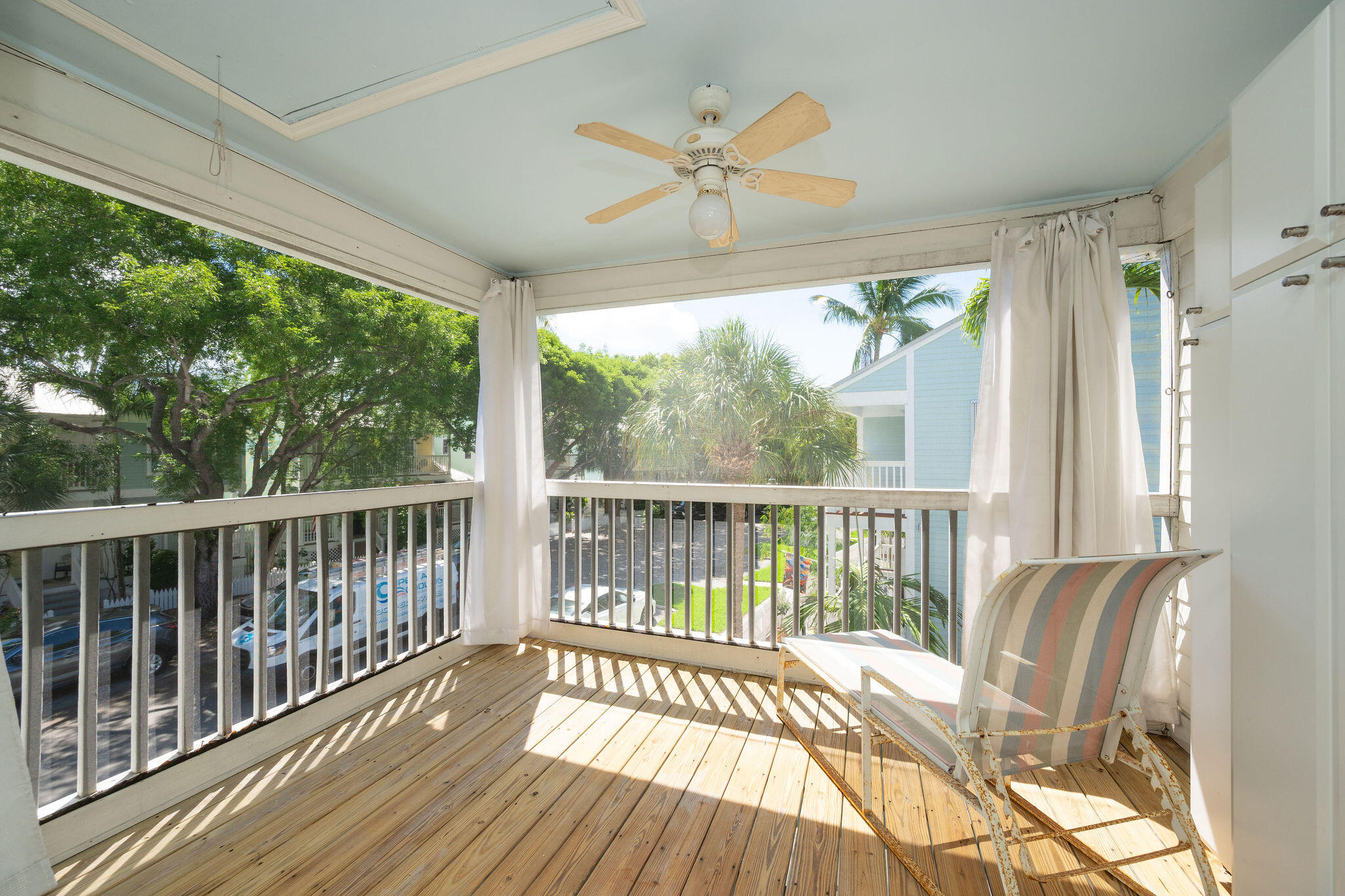 1 Spoonbill Way Key West, FL 33040 - Photo 21 of 38 a view of a balcony with wooden floor