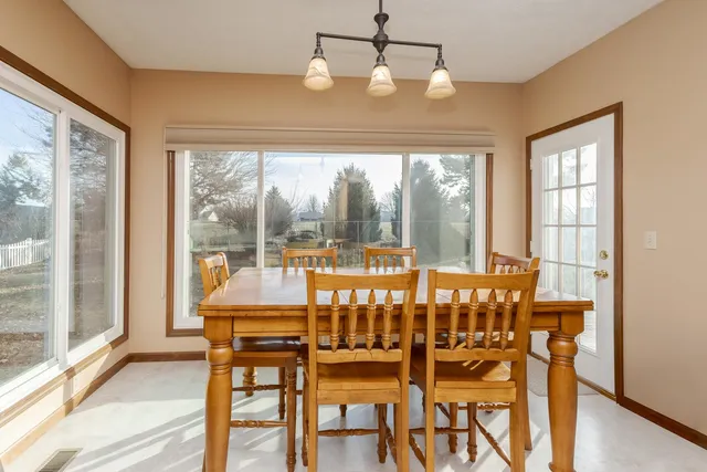 a bathroom with a sink toilet and mirror