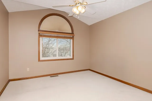 a view of a room with a hallway