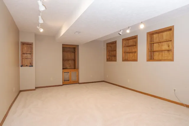 an aerial view of residential building with ocean view