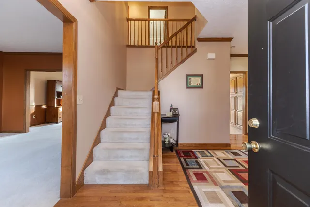 a view of an entryway with staircase
