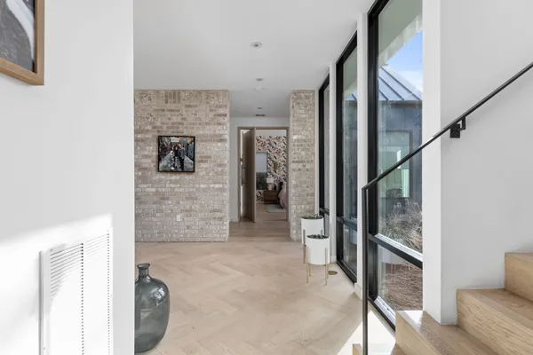 a view of livingroom with furniture and wooden floor