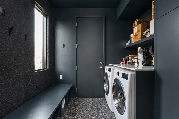 a dining room with furniture and window
