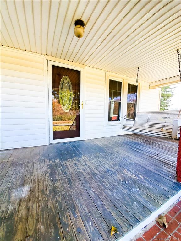 7405 Houser Farm Road Vale, NC 28168 - Photo 5 of 28 a view of a room that has wooden floor and window