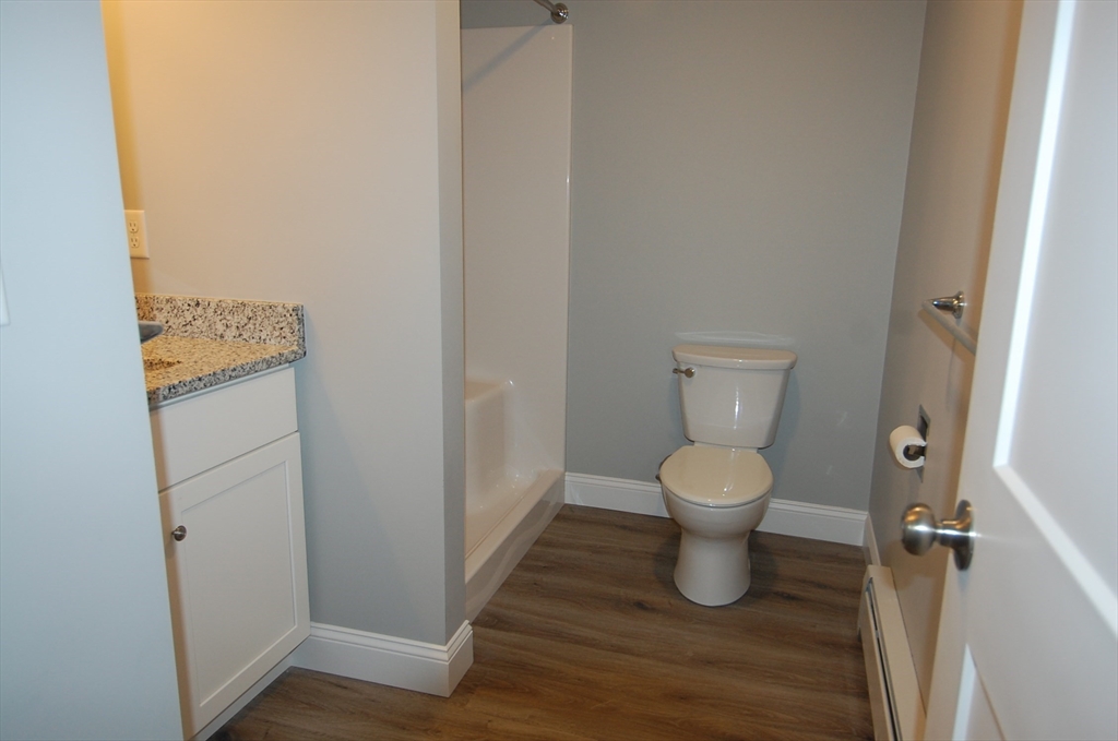 9 Bolton Road, Unit S Dartmouth, MA 02748 - Photo 7 of 19 a bathroom with a toilet