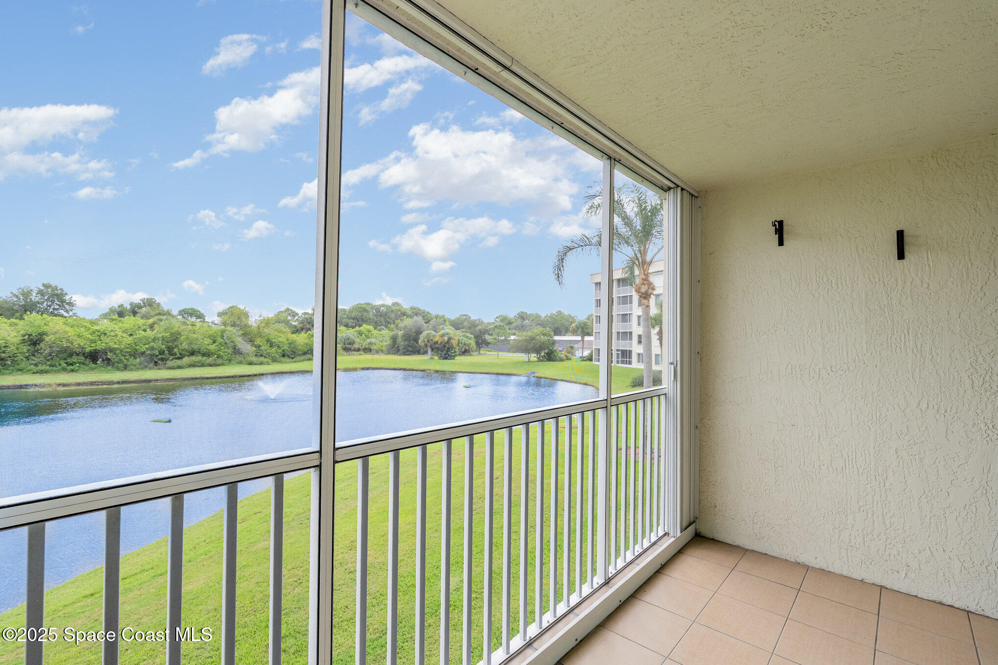 1410 Huntington Lane, Unit 1204 Rockledge, FL 32955 - Photo 1 of 30 Watch the launches over the lake