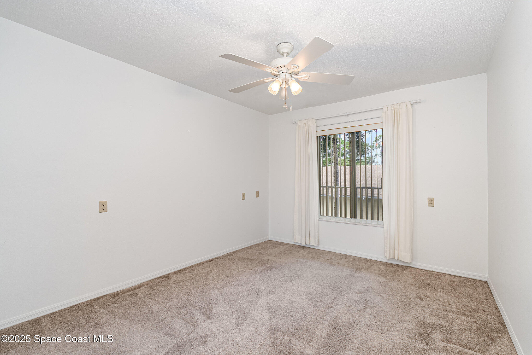 1410 Huntington Lane, Unit 1204 Rockledge, FL 32955 - Photo 12 of 30 Guest Bedroom