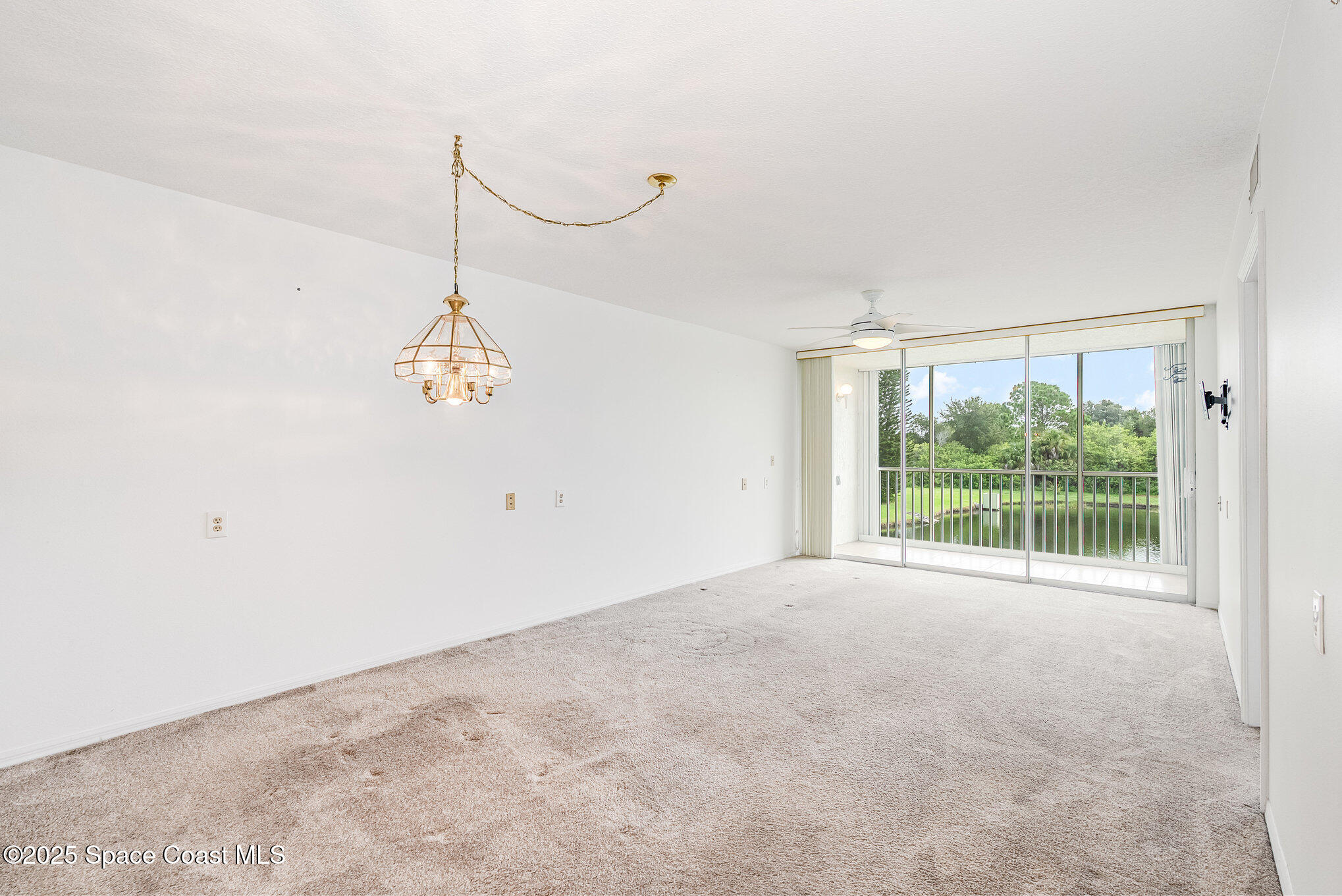 1410 Huntington Lane, Unit 1204 Rockledge, FL 32955 - Photo 5 of 30 Spacious Living/Dining Room