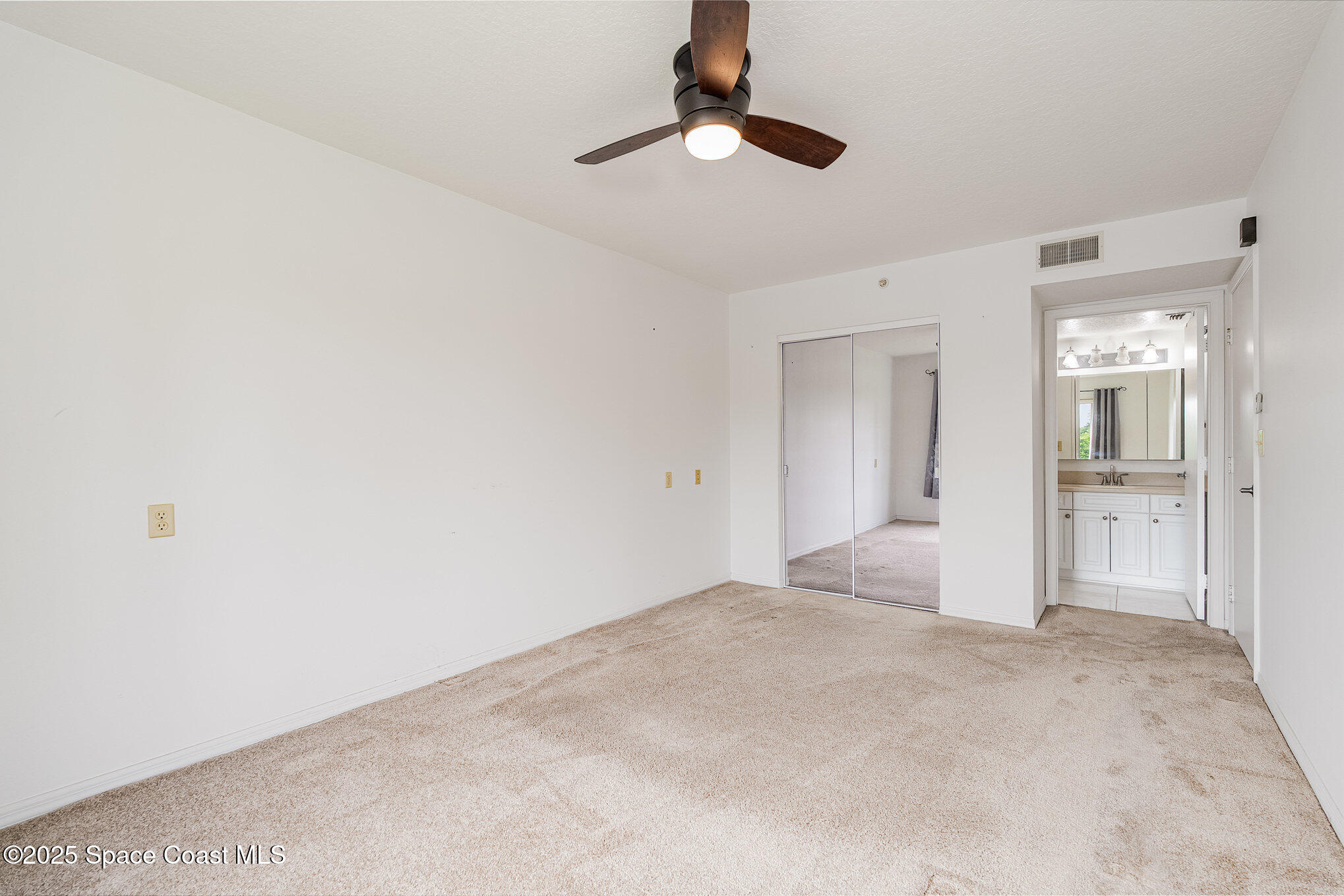 1410 Huntington Lane, Unit 1204 Rockledge, FL 32955 - Photo 10 of 30 Master Bedroom