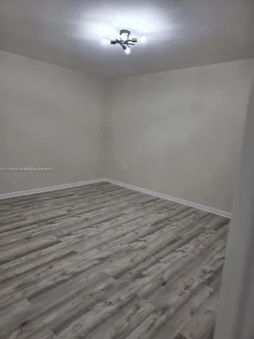 wooden floor in empty room