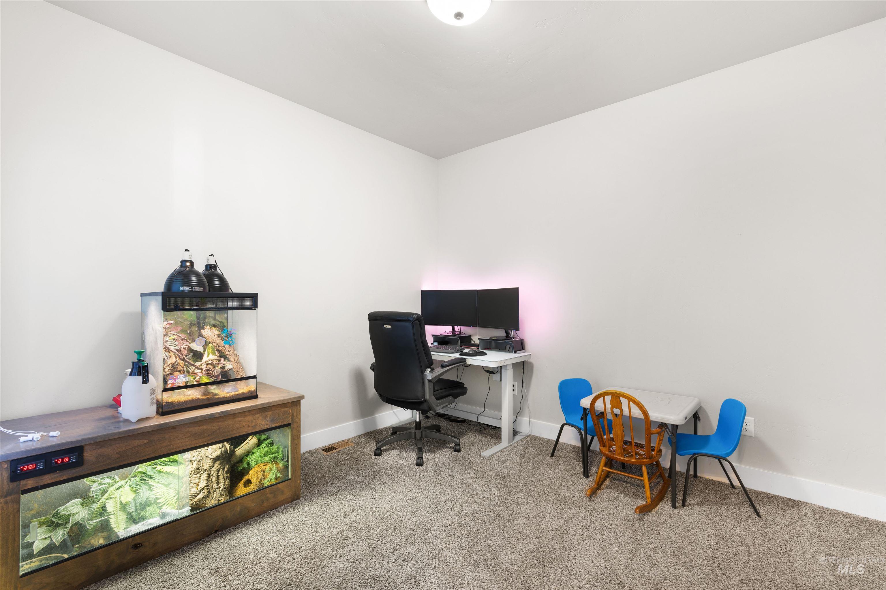 2958 Sunlight Road Twin Falls, ID 83301 - Photo 31 of 40 Neutral wall color, wall-to-wall carpeting, and overhead lighting