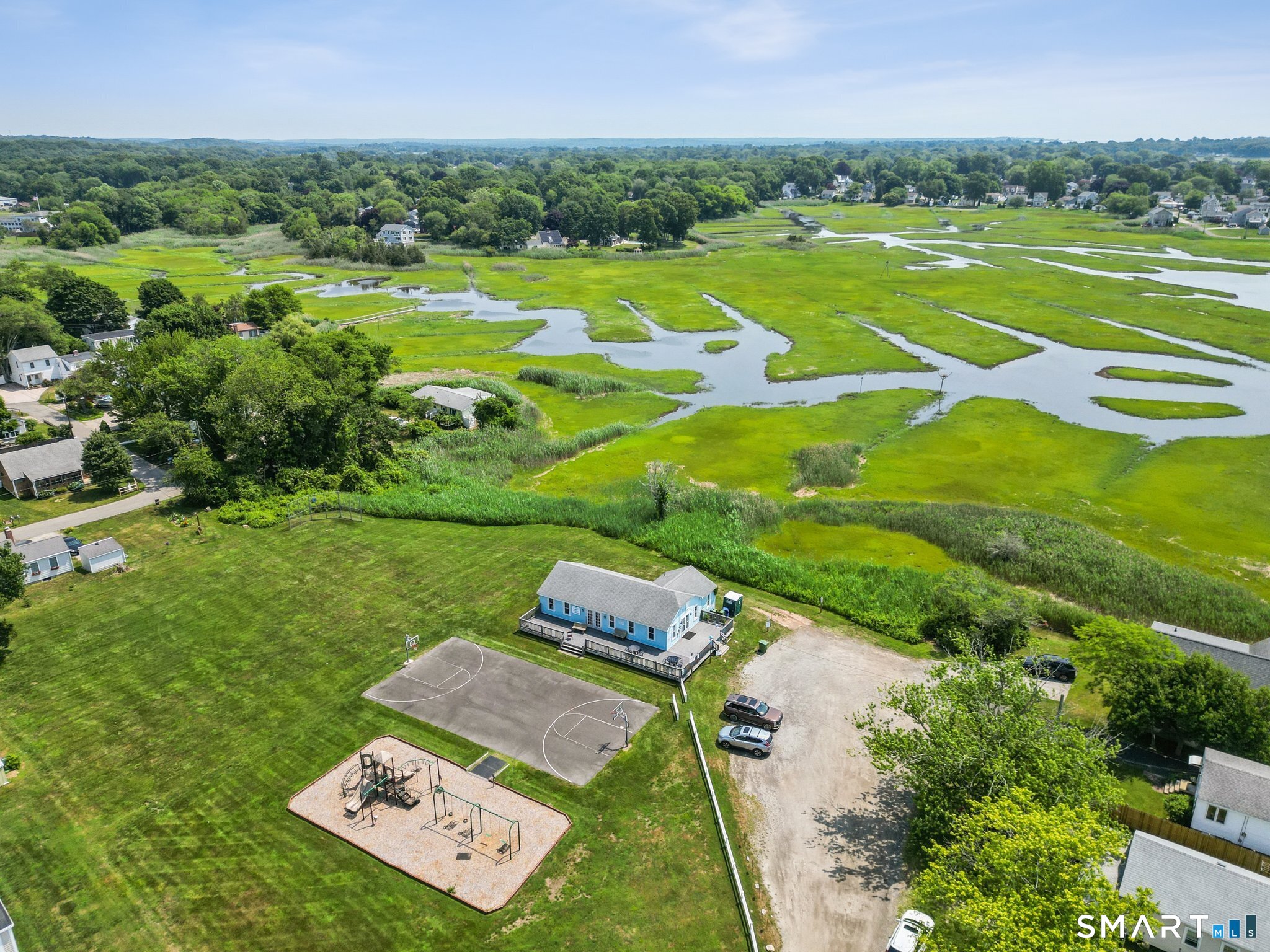53 Chalker Beach Road Old Saybrook, CT 06475 - Photo 20 of 24 Additional club house, basketball courts, and playground. Host community events.