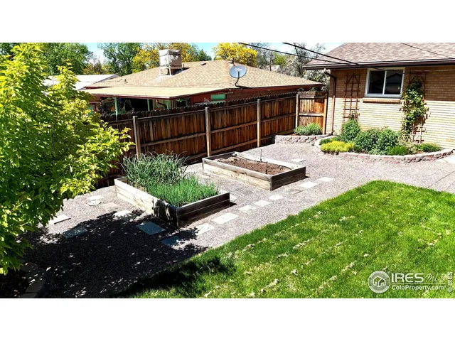 a balcony with table and chairs