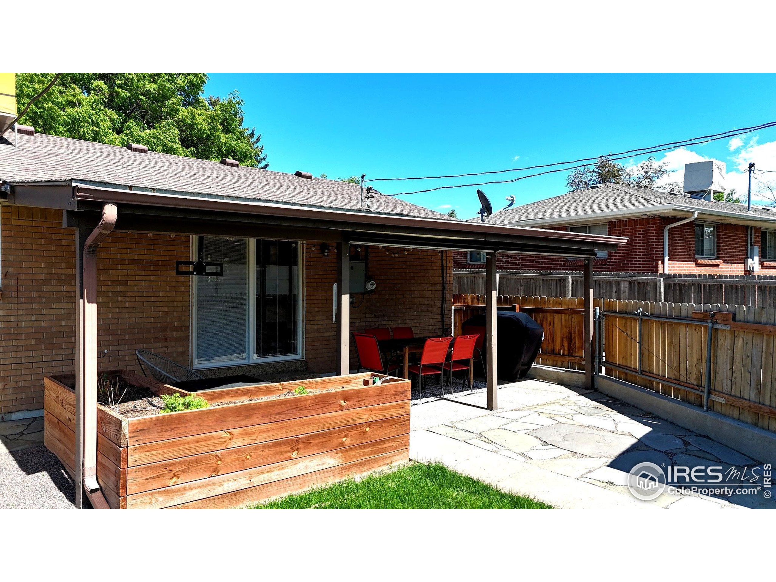 9261 Julian Way Westminster, CO 80031 - Photo 33 of 33 a view of a dinning room with a patio