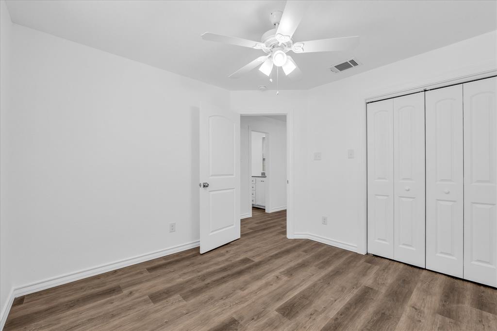 204 North Wiebusch Street Riesel, TX 76682 - Photo 25 of 33 a view of an empty room with wooden floor