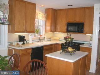 269 Madison Road Huntingdon Valley, PA 19006 - Photo 4 of 6 a kitchen with a sink cabinets and a table
