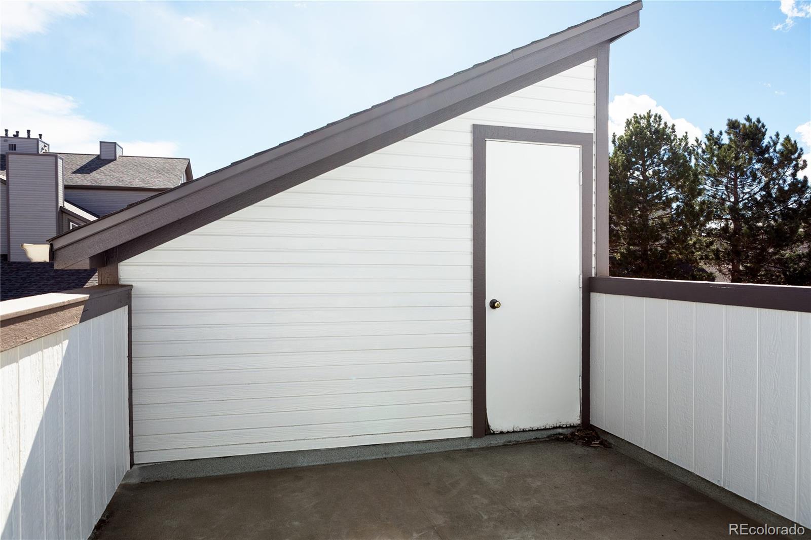 5081 Garrison Street, Unit 9 Wheat Ridge, CO 80033 - Photo 27 of 31 a view of front door