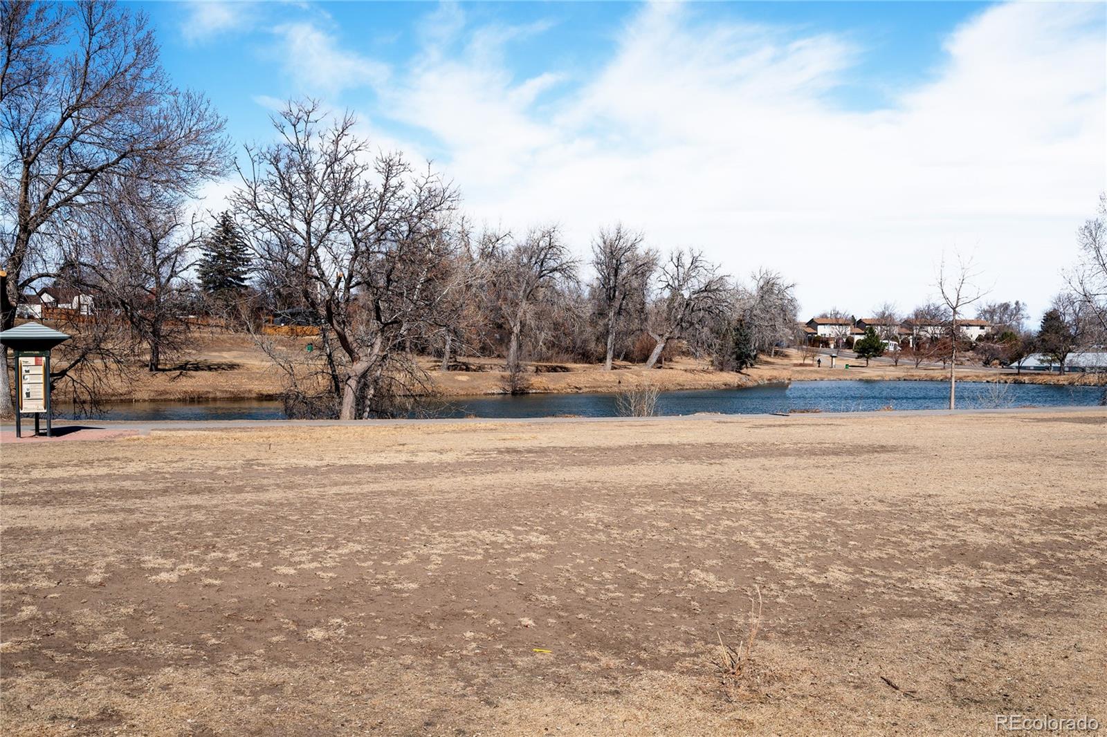 5081 Garrison Street, Unit 9 Wheat Ridge, CO 80033 - Photo 31 of 31 a view of dirt field with trees