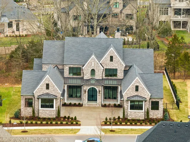 a front view of a house with a porch