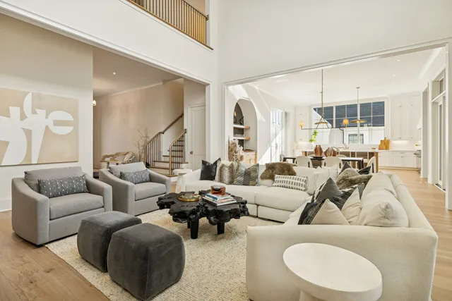 a view of a hallway view with wooden floor and staircase